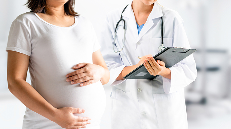 Pregnant women and a doctor